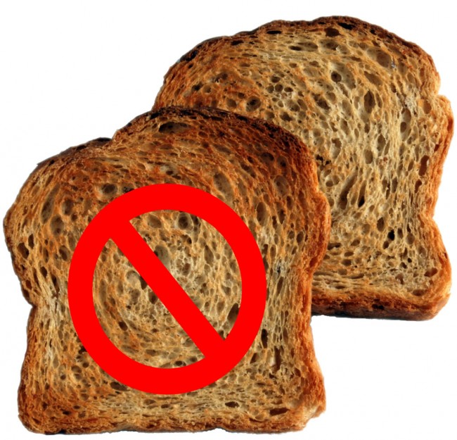 Two slices of toast with a red no symbol imprinted on one.