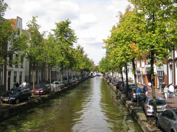 canal and tree-lined street in Delft