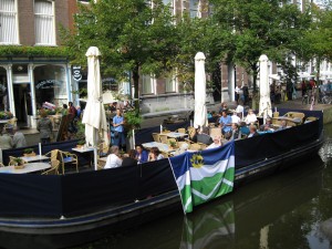 cafe on a barge on canal in Delft