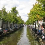 canal and tree-lined street in Delft