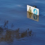 Signs submerged by flood water