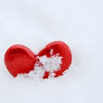 Red heart on snow to represent how the menopause almost destroyed my relationship.